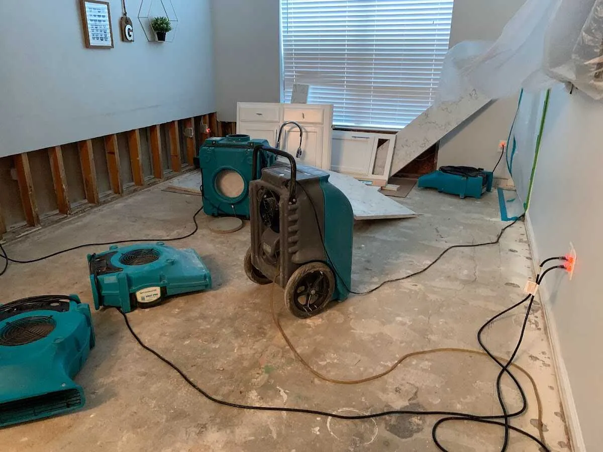 Dehumidifier in flood-cut room for Water Damage Restoration in Bernalillo